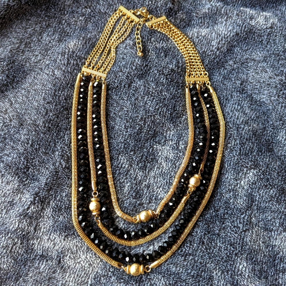 Tarte multi chain gold and black bead necklace